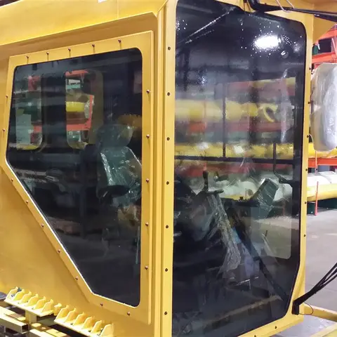 Equipment cab glass