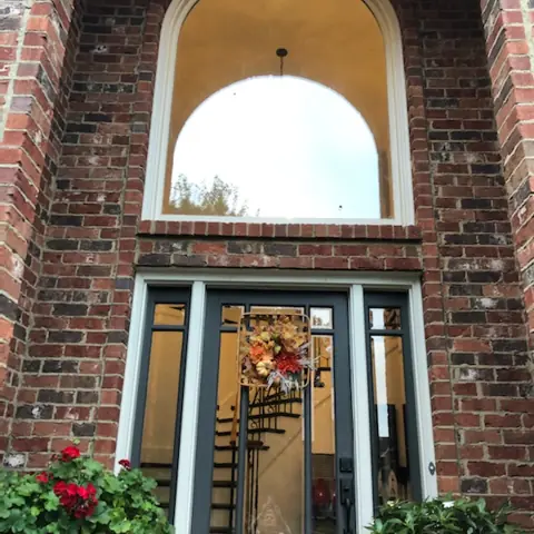 Arched entry window